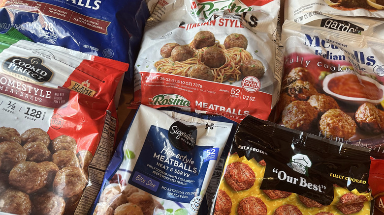 Bags of frozen meatballs arranged on a table