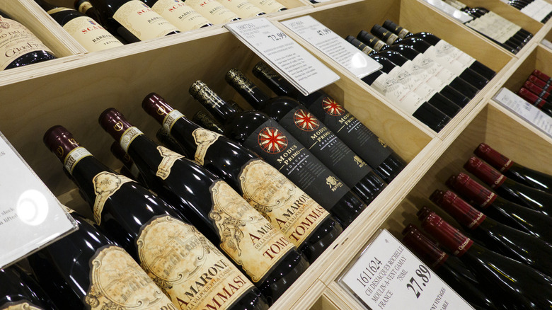 Wooden crates with red wine bottles in Costco