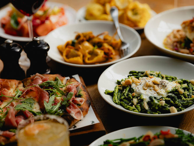 A spread of food at Italian Greyhound, Marylebone