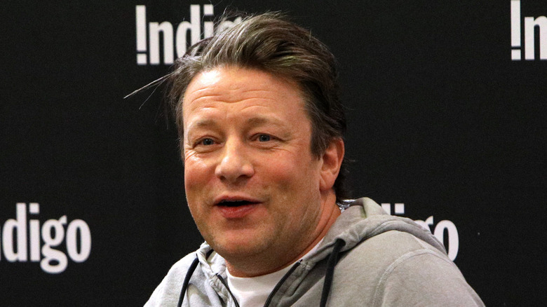 Jamie Oliver speaking at an event