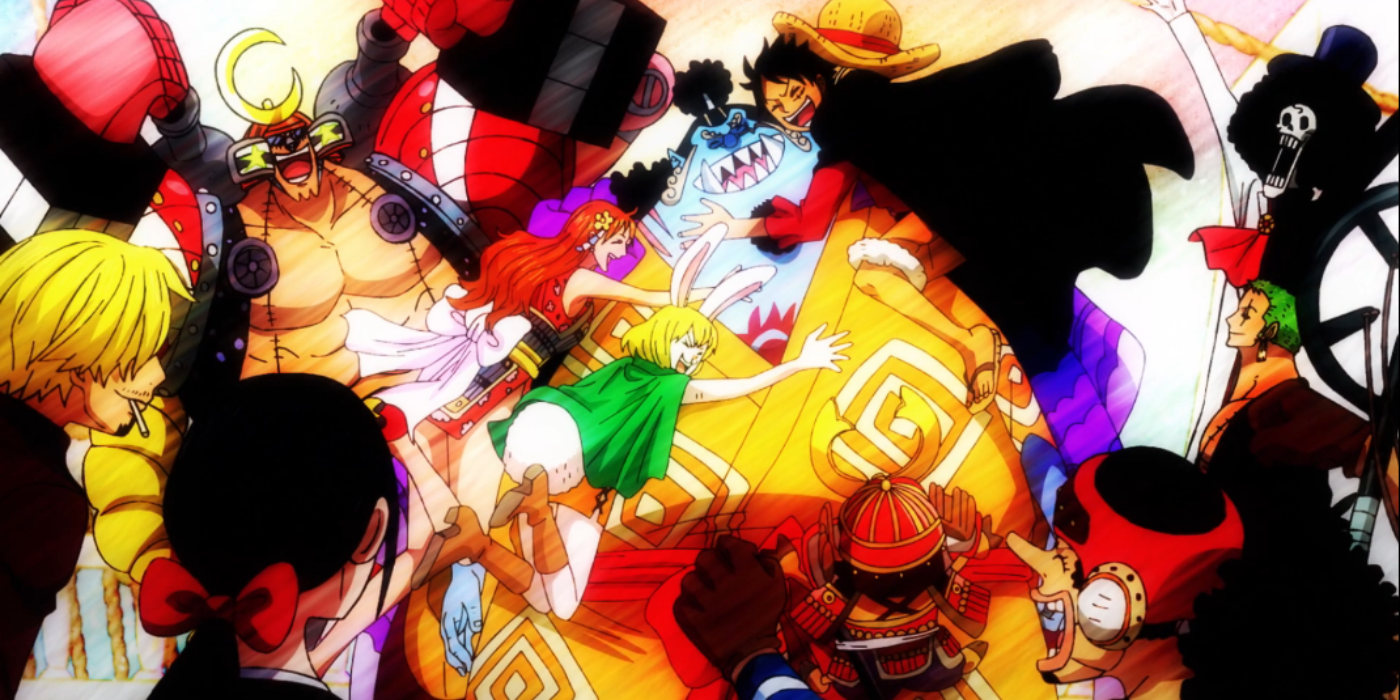 Jinbe is being hugged by Nami, Carrot and Monkey D. Luffy while the rest of the Straw Hats, including Robin, Sanji, Usopp, Tony Tony Chopper, Roronoa Zoro, Brook and Franky, surround him and cheer during their reunion in One Piece's Wano Country arc.