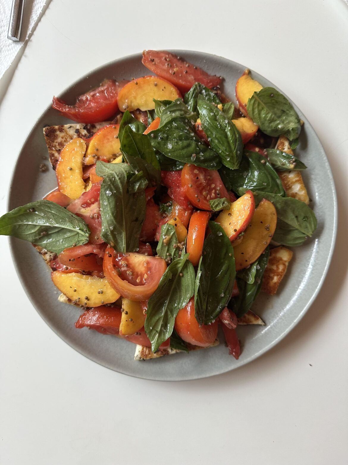 I made Molly Baz’s Peach and Tomato Salad w/ Halloumi for dinner
