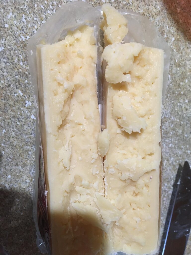 Is it ok for Parmesan cheese to look wet in the inside?
