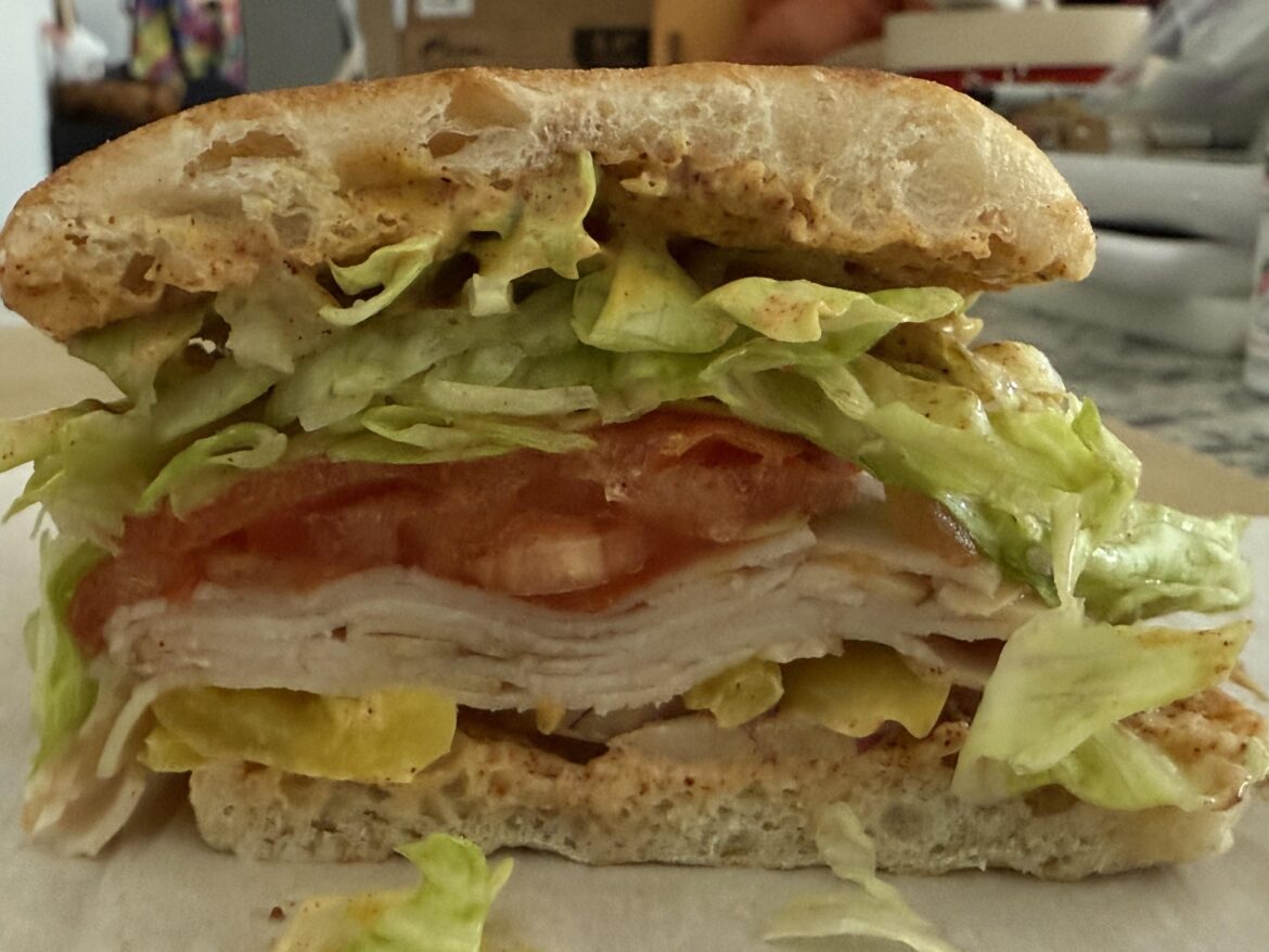 Average workday lunch: smoked turkey with banana peppers, onion, tomatoes, lettuce, and chipotle mayo.