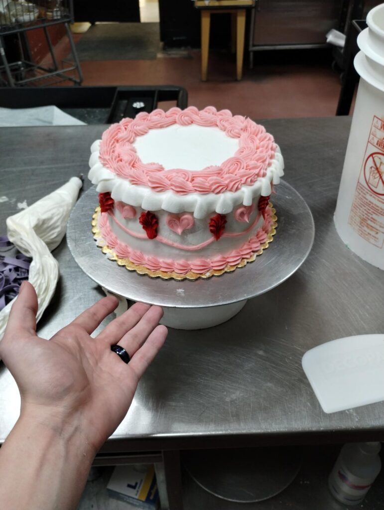 Convinced my manager to let me make a vintage cake. It was my first time trying this style.