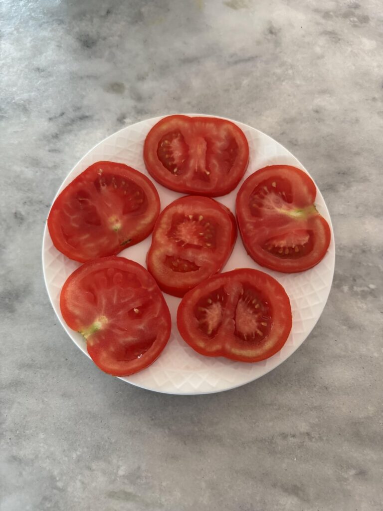 UPDATE: I ate my magnificent tomato. It was very good.