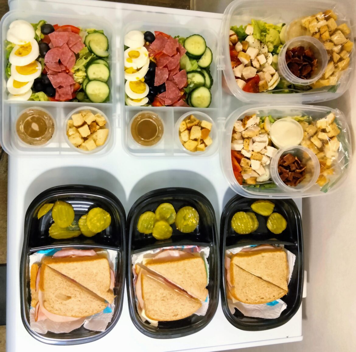 Ham and cheese sandwiches with bread-and-butter pickles, chef salad with homemade sweet basil vinaigrette, BLT salad with blue cheese