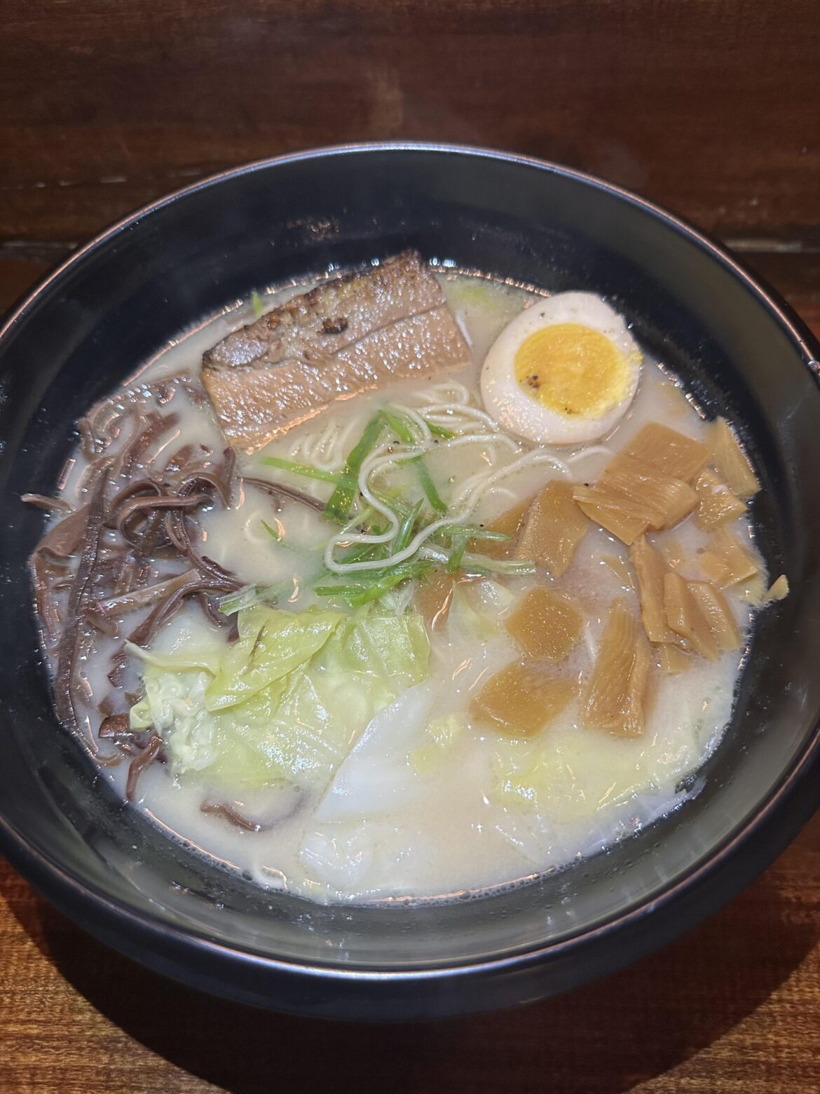 My favorite Tonkotsu ramen at Yama Ramen in midtown near Rockefeller center. Rich and creamy broth and the pork belly melts in your mouth.