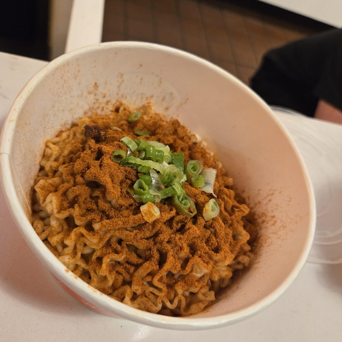 Asked for extra chili powder for the noodles while waiting for boba milk tea :)