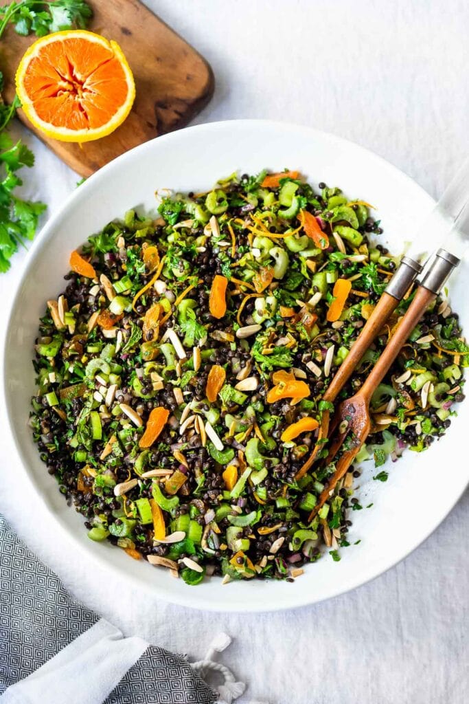 Moroccan lentil salad with crunchy veggies, dried apricots, almonds, and herbs.