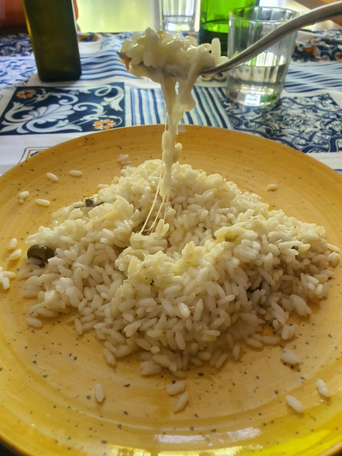 Rice with diced Asiago cheese, pitted olives, and extra virgin olive oil (for cheese lovers)