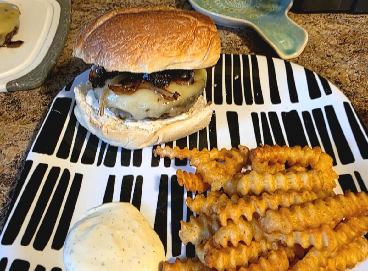 Burger. Pepper jack. Caramelized onions. Homemade garlic sauce. Portuguese roll. Yum.