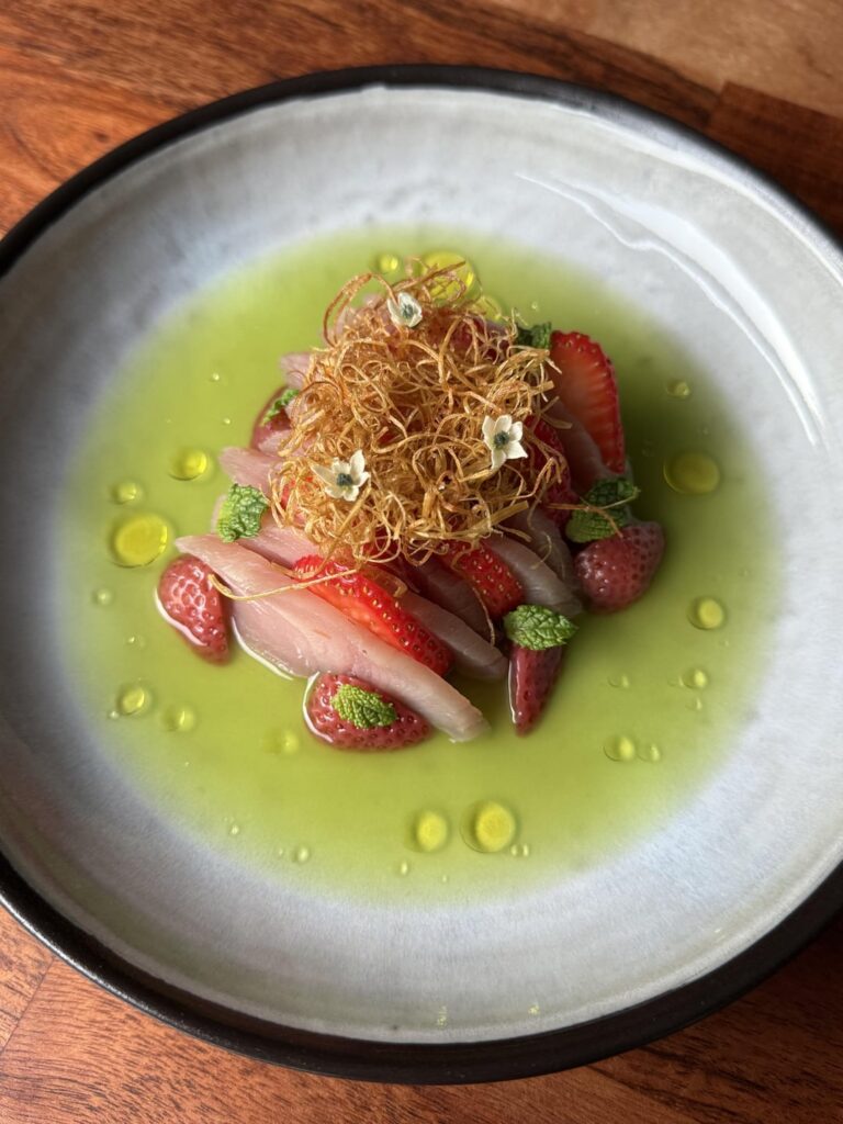 Citrus Cured Hamachi Crudo | Honeydew & Yuzu Aquachile | Fresh Strawberries | Pink Peppercorn Pickled Strawberries | Fried Leeks | Mint | Arbequina Olive Oil