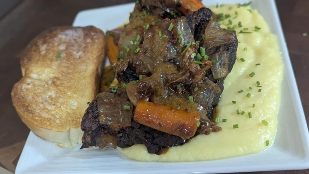 Smoked and braised beef neck bone bourguignon on a Yukon gold mash. The marrow gravy split but the flavor was great Smoked and braised beef neck bone bourguignon on a Yukon gold mash. The marrow gravy split but the flavor was great