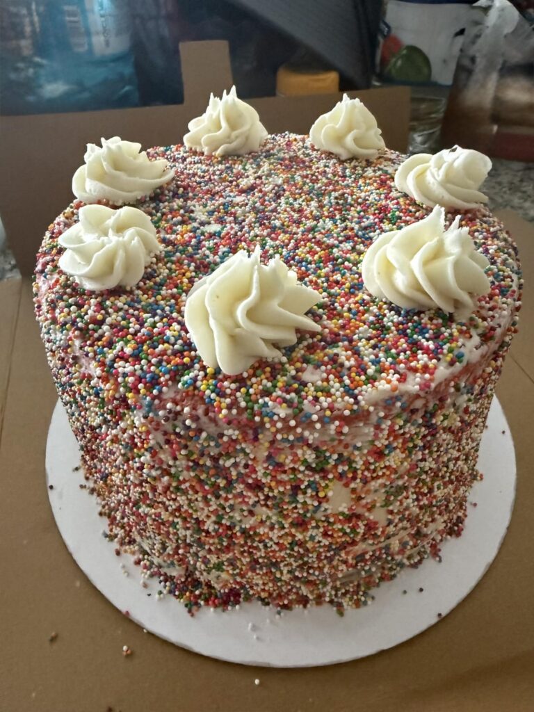 4 tier Rainbow cake made for a coworker!