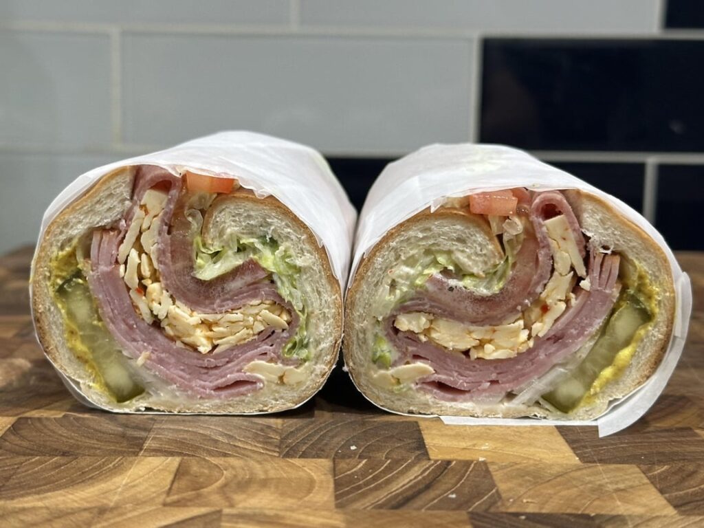 it’s 11:43pm and this is a spicy ham and salami sub
