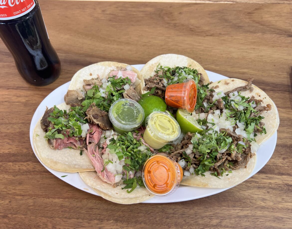 Carnitas and asada tacos from Tacos Al Molcajete