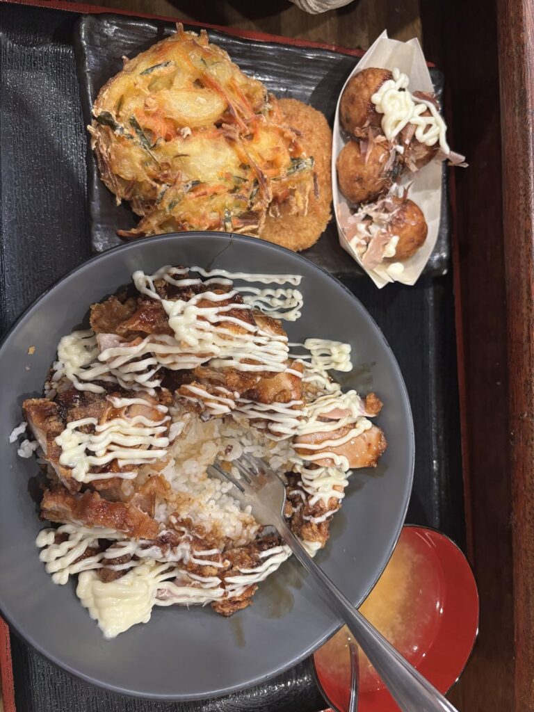 How many cals did I eat? 2 of the octopus balls, most of the chicken and some of the rice, a bite of the veggie tempura