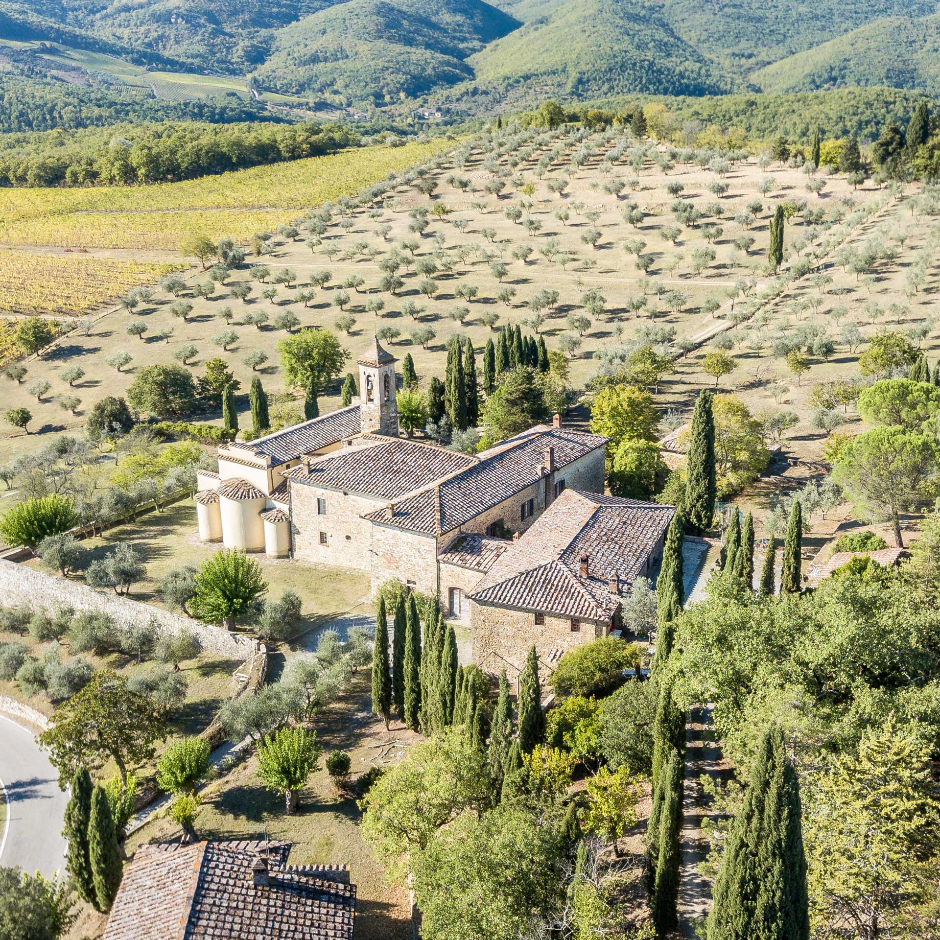 At Pieve Aldina, walking trails lead through the trees towards small villages.