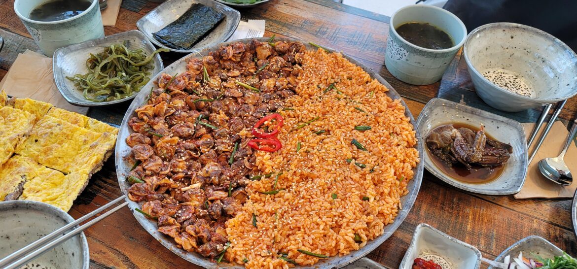 Clams and fried rice at a restaurant in Busan