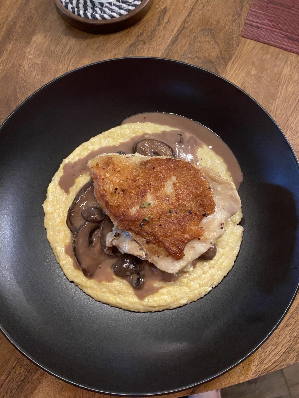 Chicken thigh with mushroom Marsala wine sauce and creamy polenta