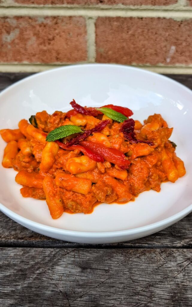 HOME-MADE CAVATELLI, BELL PEPPER CREAM, PORK SAUSAGE