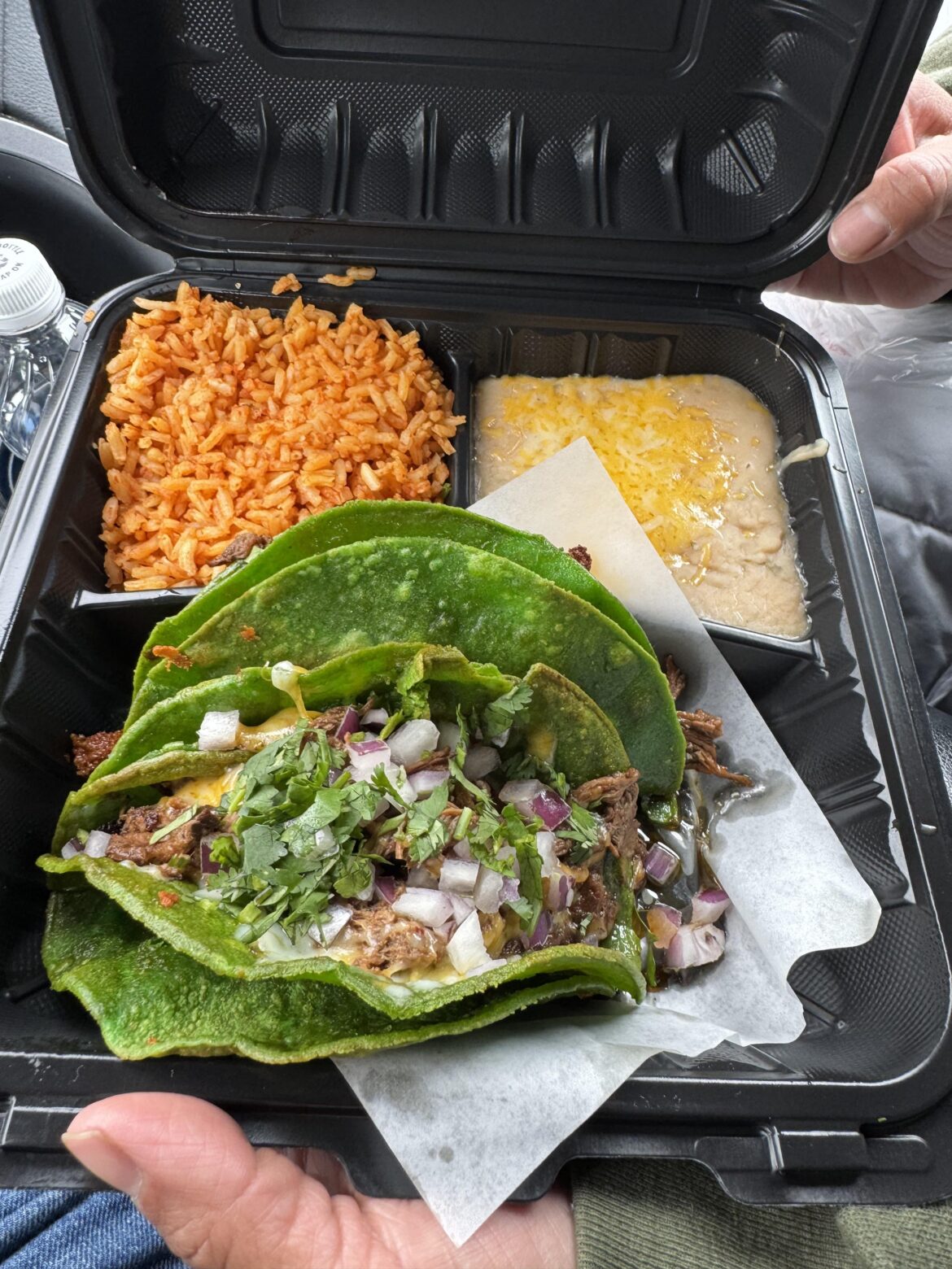 I see your blue tacos and raise you these green birria tacos