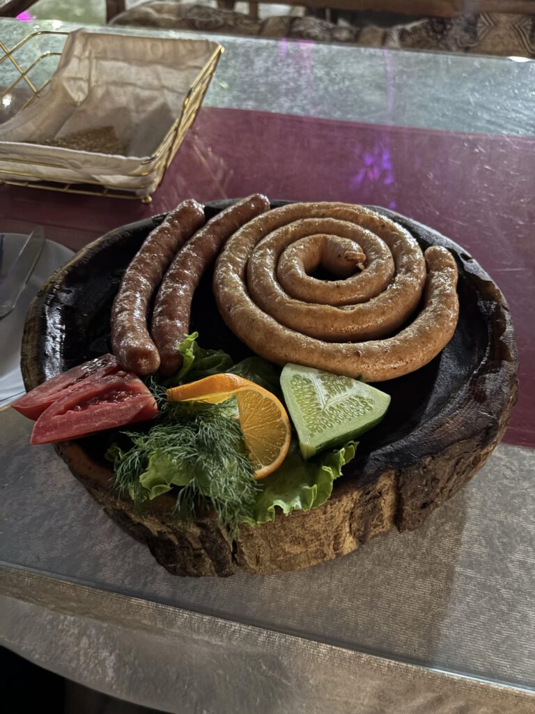 Sausages on a log/stump in Uzbekistan