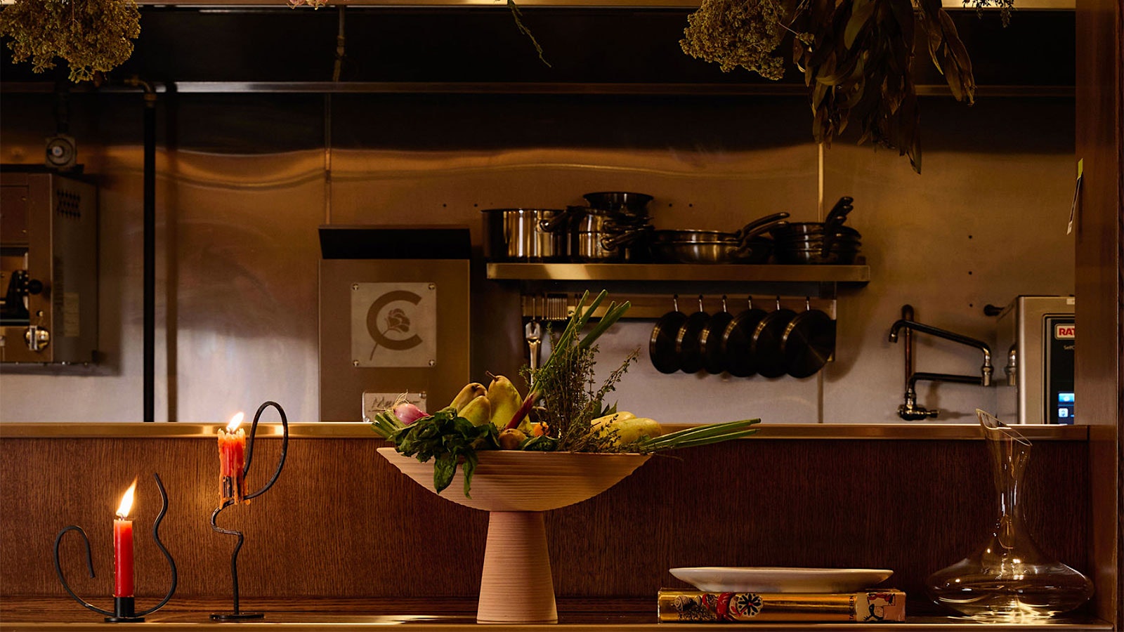  The chef’s table at Claudine decorated with hanging dried flowers