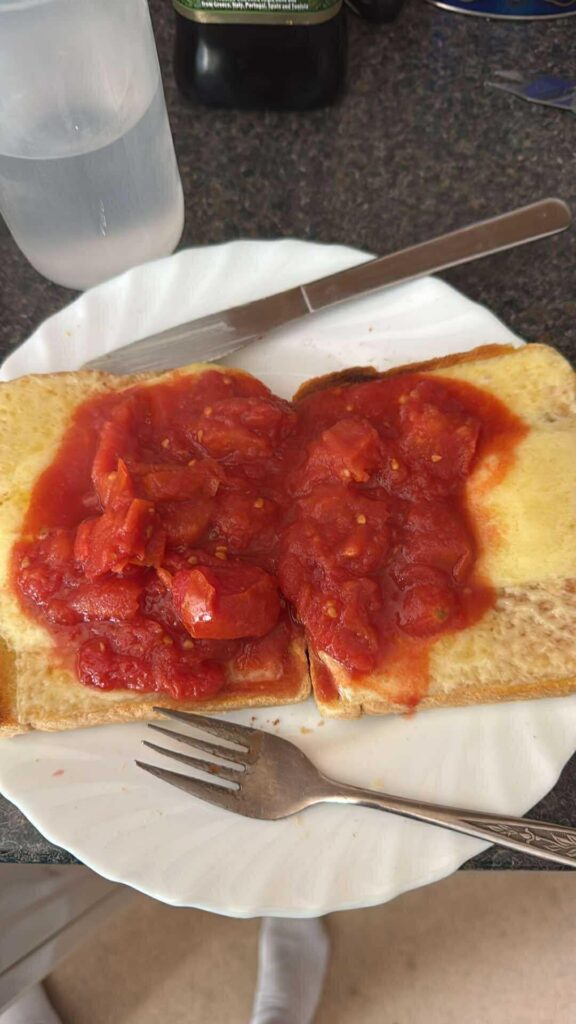 My brothers' tinned tomatoes on cheese on toast