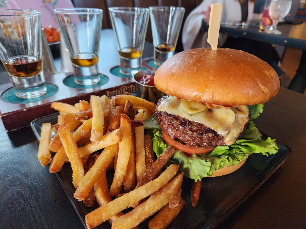 Steak burger with fries and a bourbon flight!