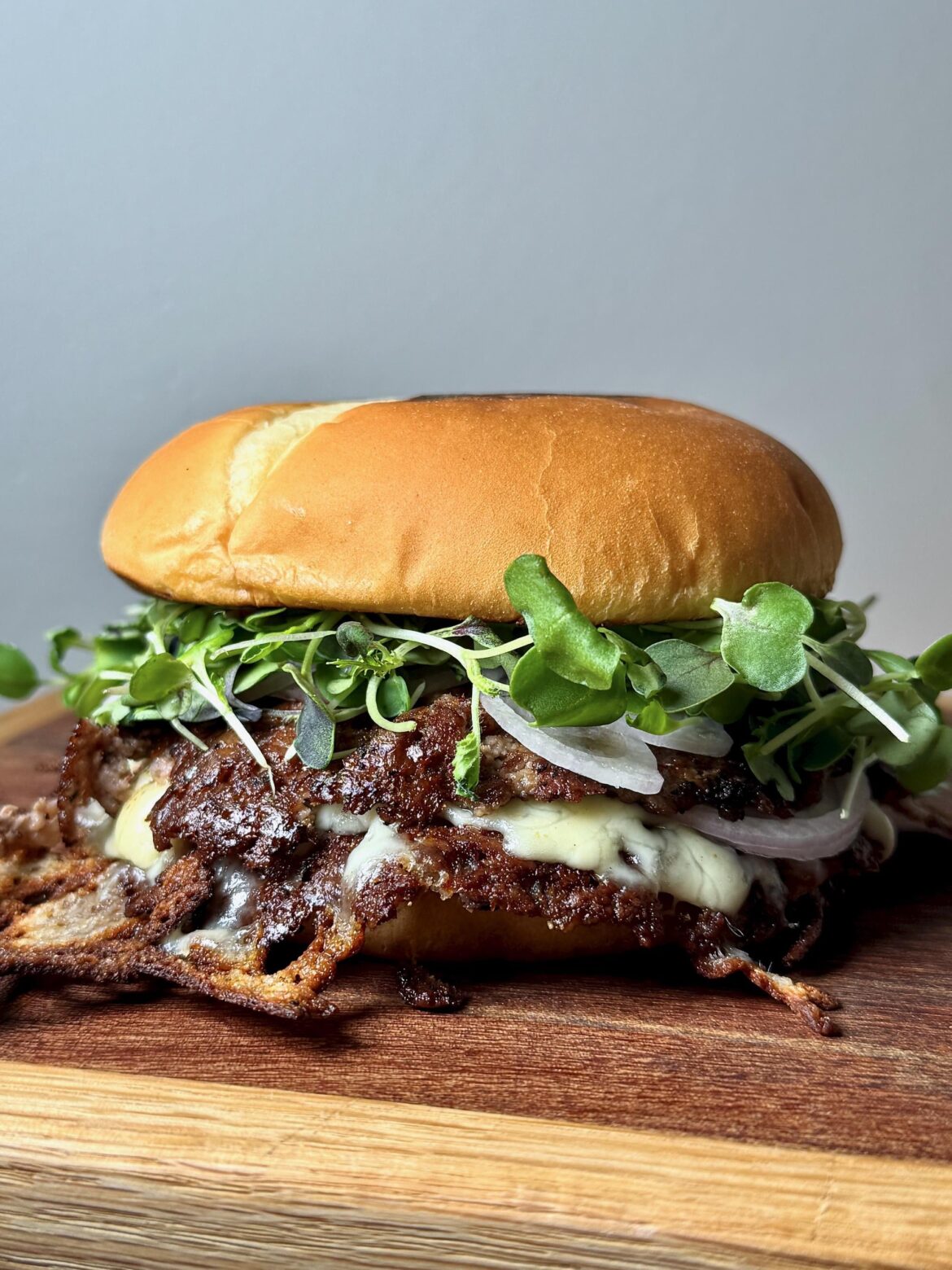 A little double-smash with pepper Jack, burger sauce, and micro greens. [OC]