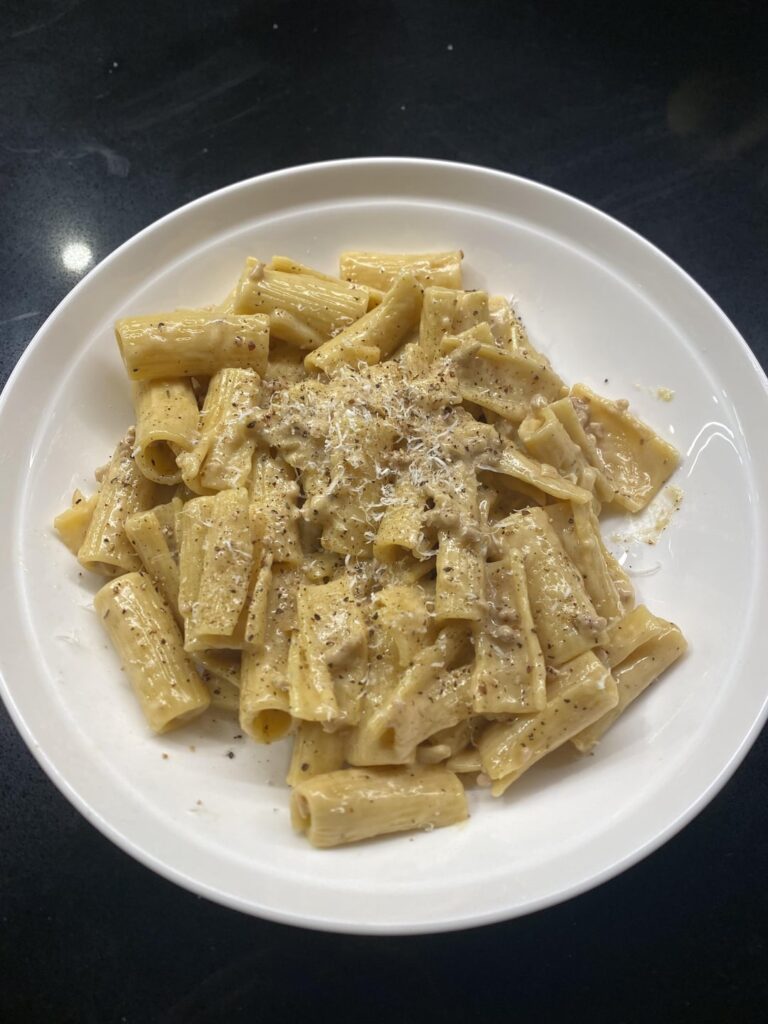 Truffle and sausage pasta, served with roasted Brussels sprouts
