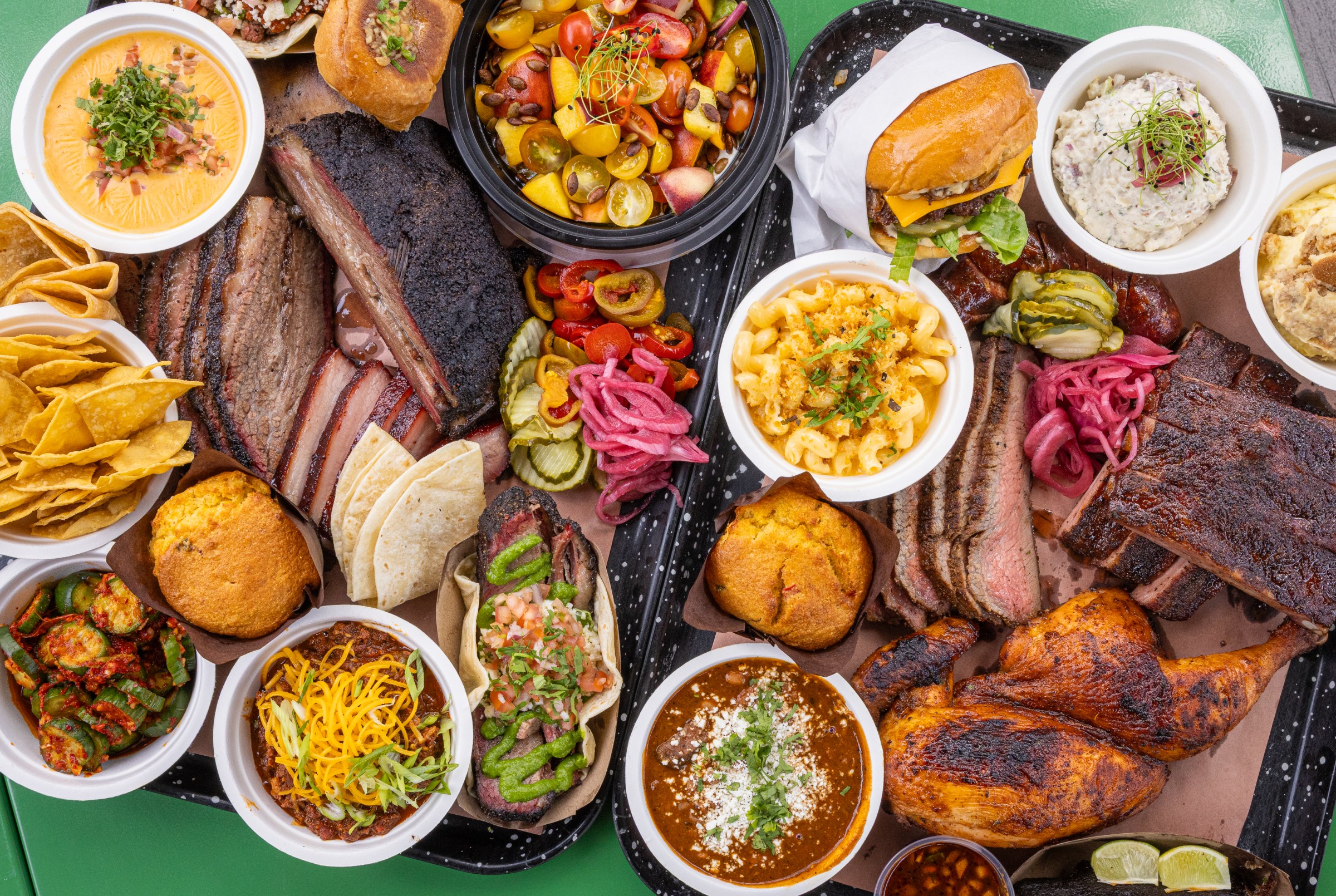 A huge array of foods on trays at Heritage Barbecue in California.