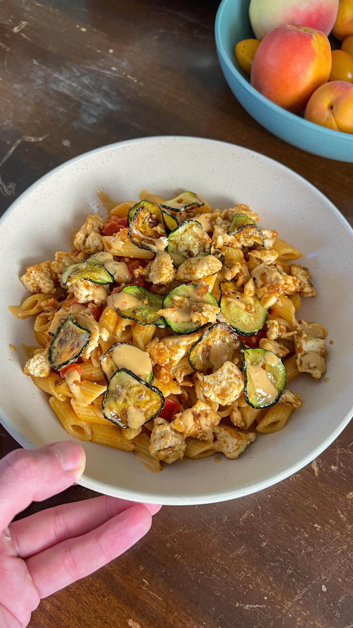 Penne with tomato peanut butter sauce, tofu and zucchini