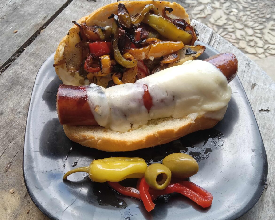 Home made smoked and grilled Italian snausage with peppers, onions, and whole milk motz.
