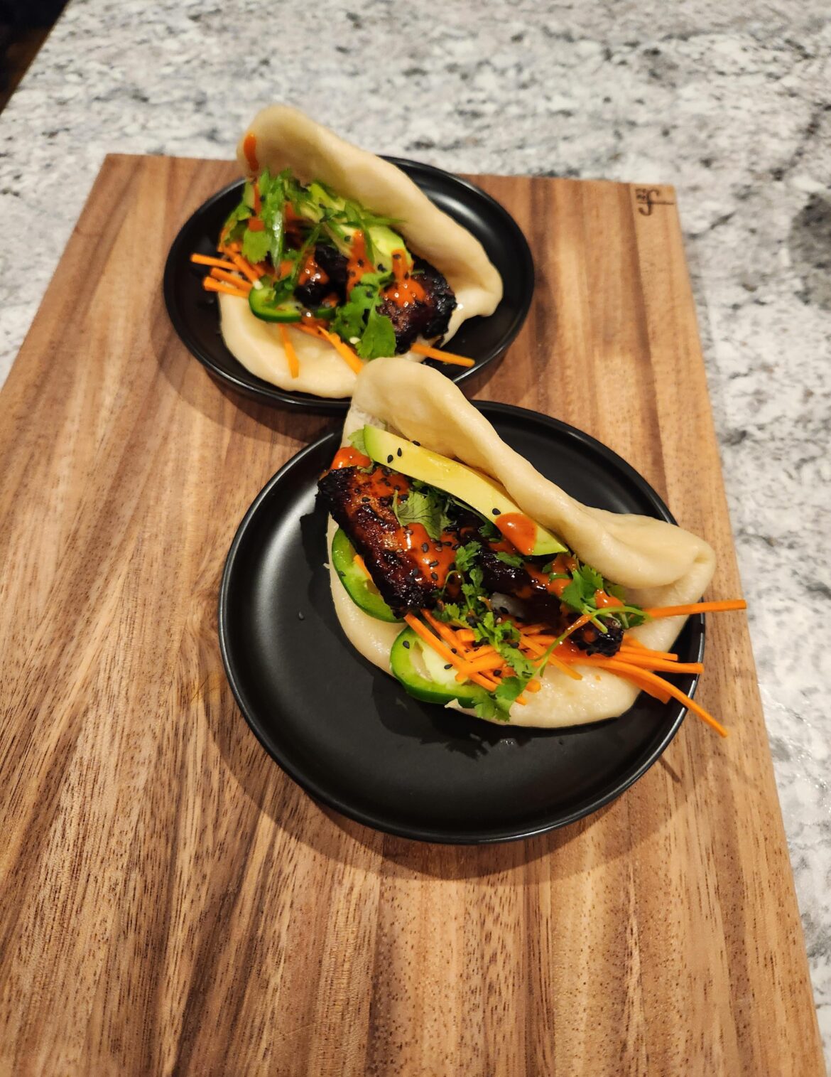 Spicy pork belly bao buns