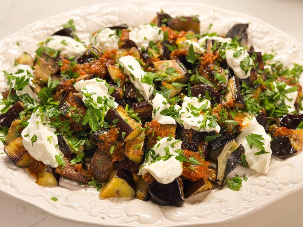 Köpoğlu (Turkish Eggplant and Peppers with Tomatoes and Garlicky Yogurt) by Courtney Hill with Chris Kimball from Milk Street, Jan./Feb. 2023