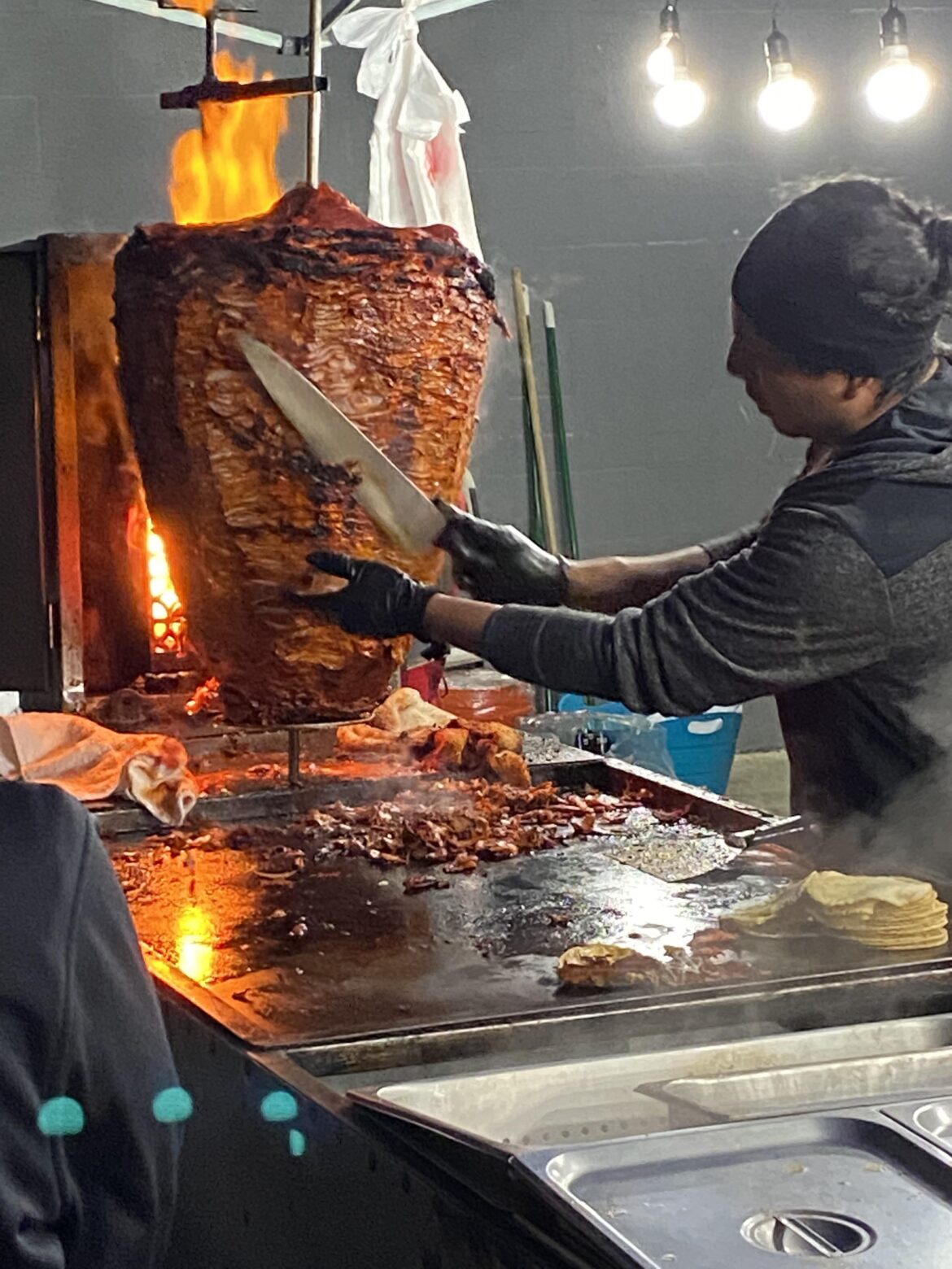 Anyone know roughly how much these stands pay for a thing of Al Pastor on the spit?