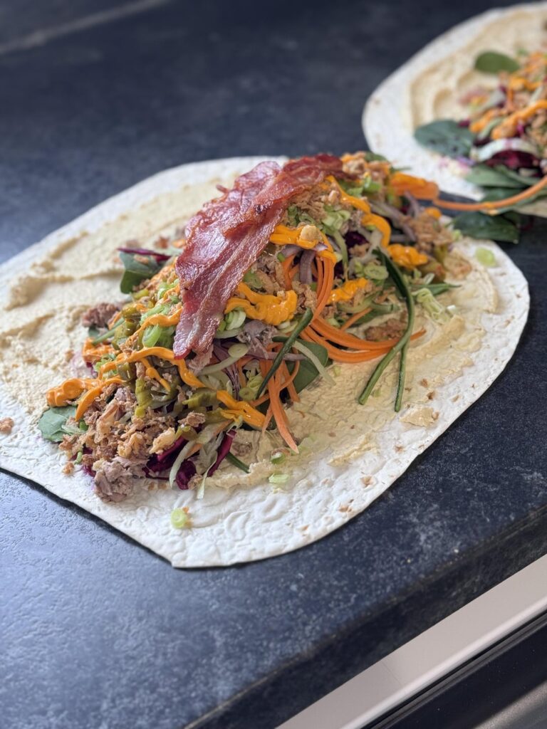 Tuna and Bacon Wrap with Garlic Wedges.