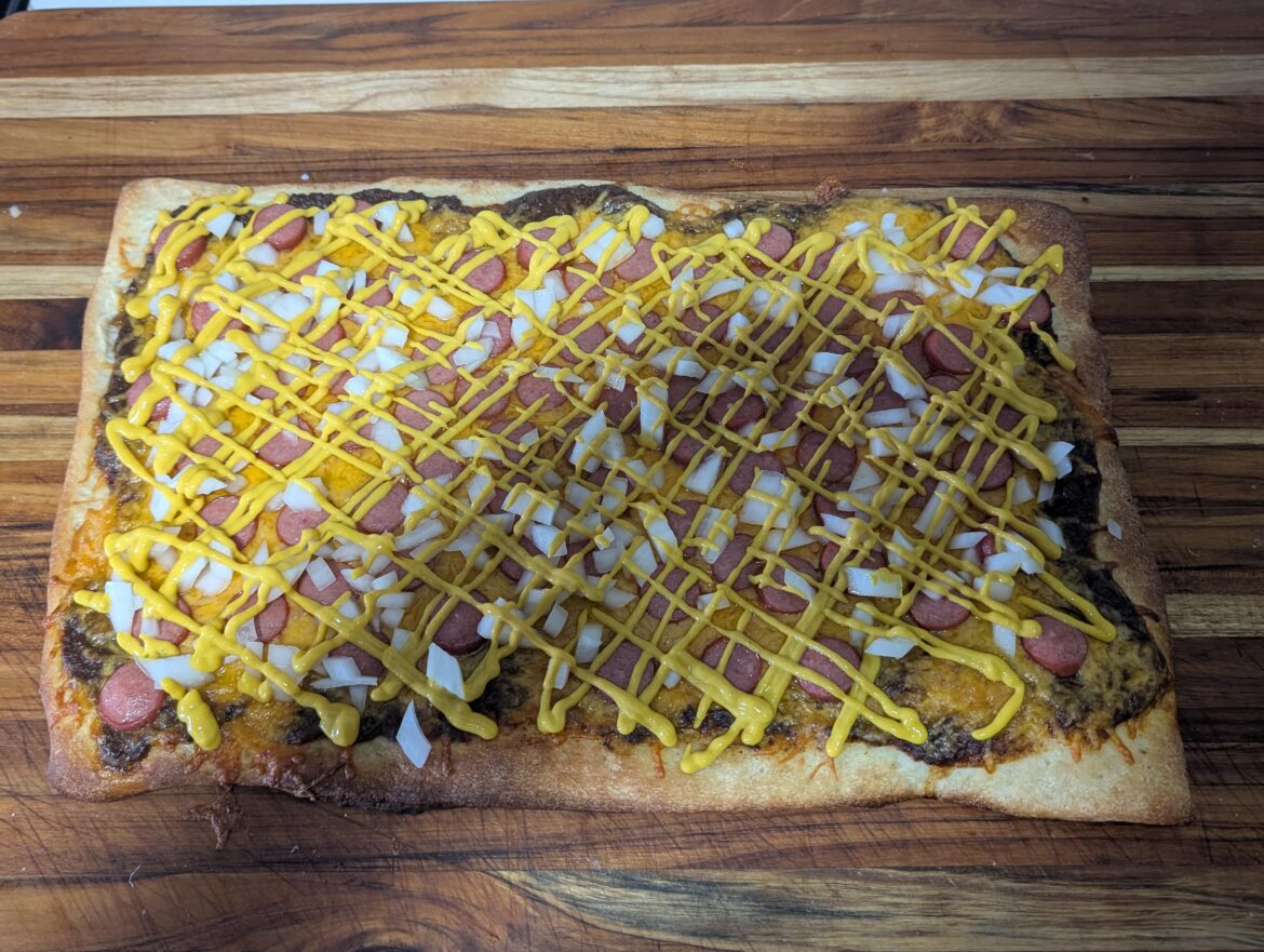 I don't care if it is a crime, but I cooked a Cincinnati Skyline chili pizza, and it is amazing.