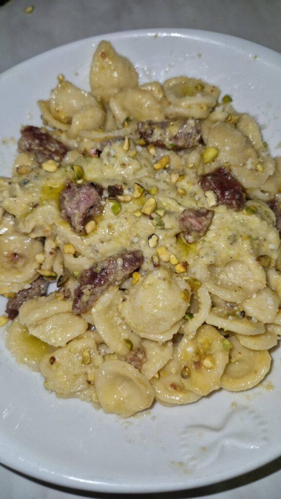 Orecchiette with pistachio cream and sausages