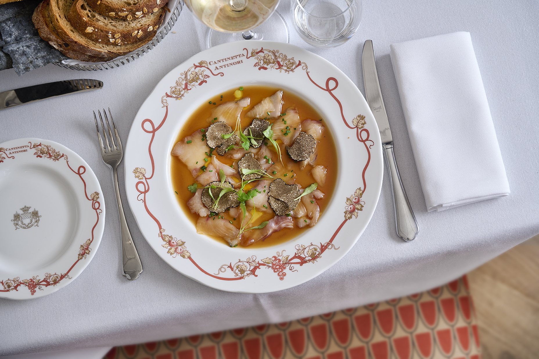 Sashimi dish on laid table
