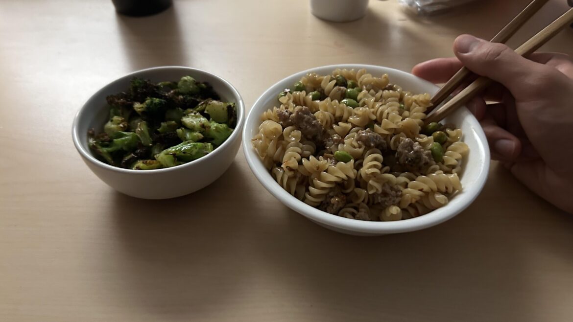 Large bowl of pasta with Teriyaki-adjacent sauce, and a side of broccoli ~500-550 calories