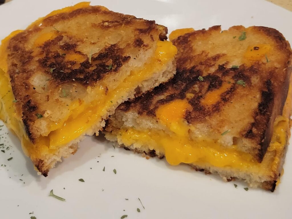Cheddar and Colby jack grilled cheese. Guess how many slices lol