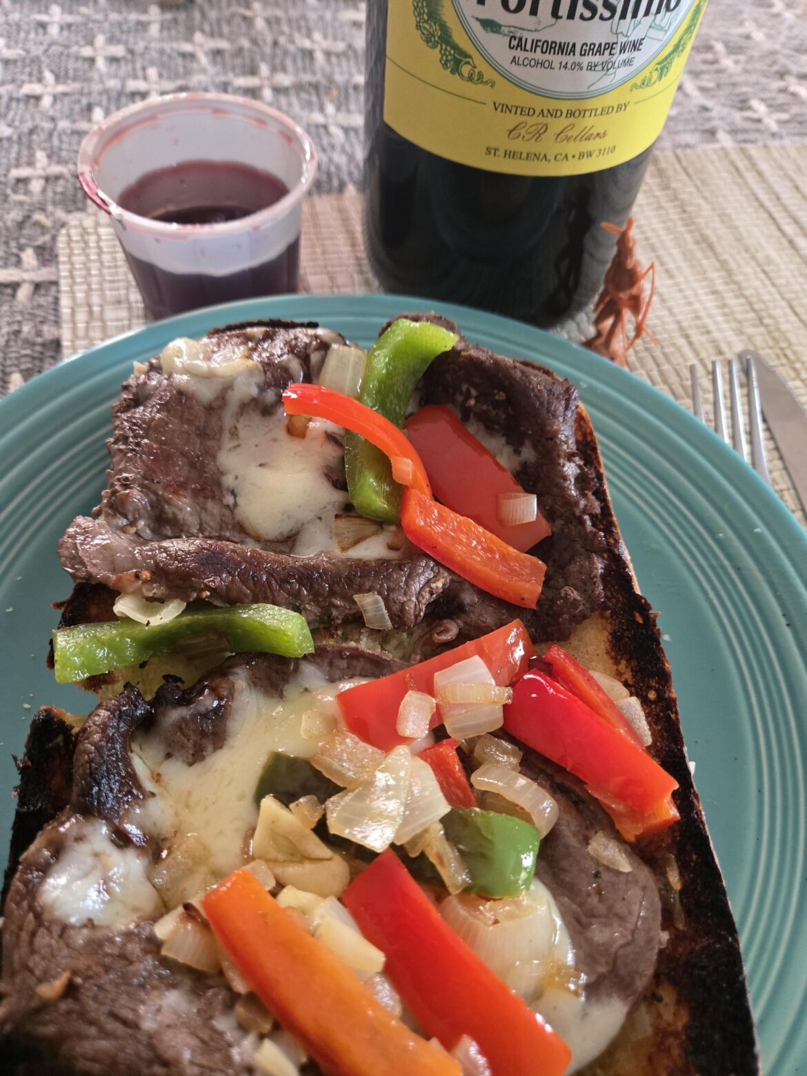 My GF made me this nice steak and pepper sandwich w melted provolone