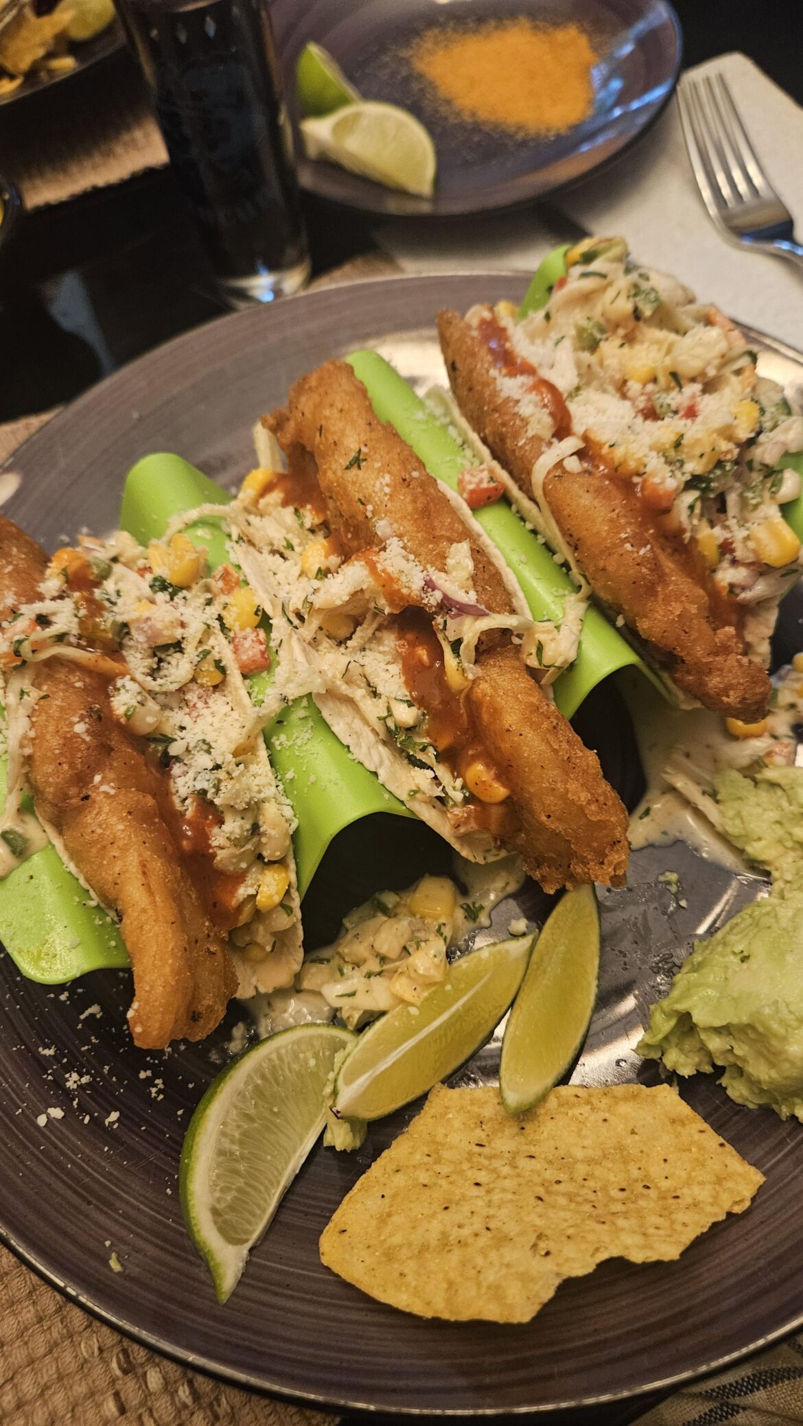 Beer battered Tilapia. Cilantro, lime, corn, slaw. Habenero sauce. Smashed avocado. Lime. Tequila.