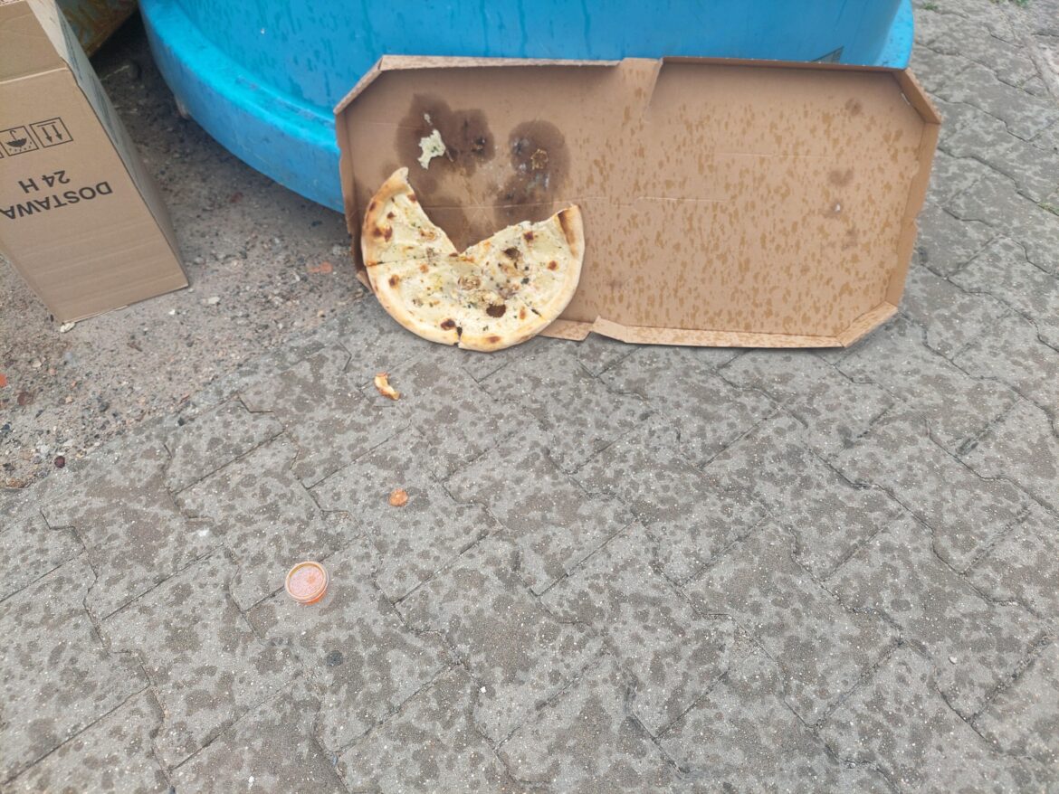 Someone ate the toppings off and dumped it