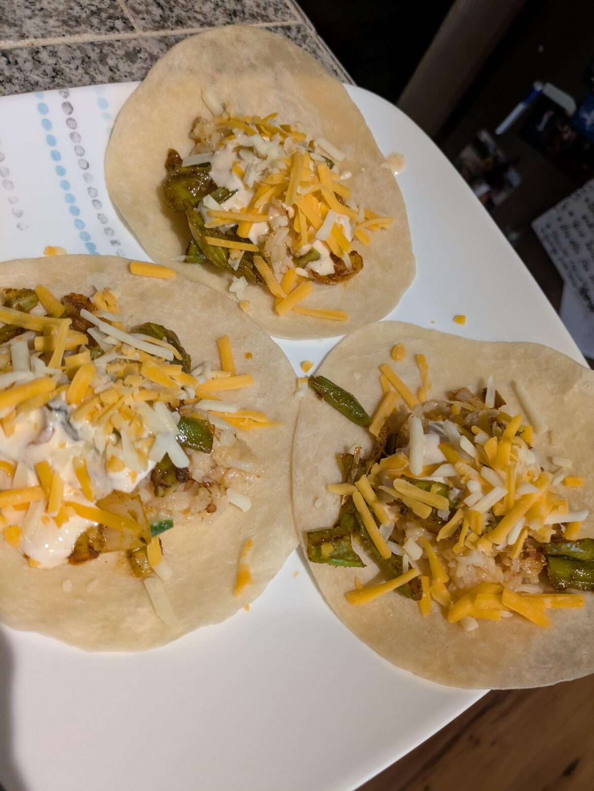 Cheesy blistered shisito pepper tacos