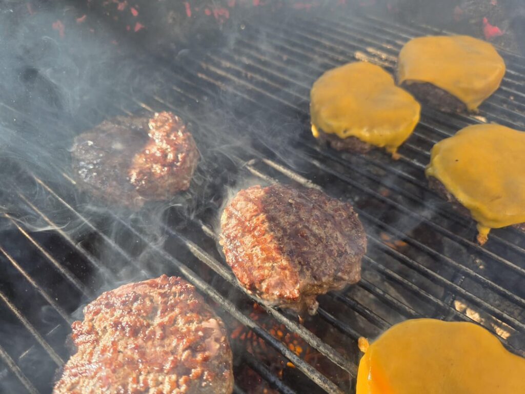 Charcoal burgers on kettle joe